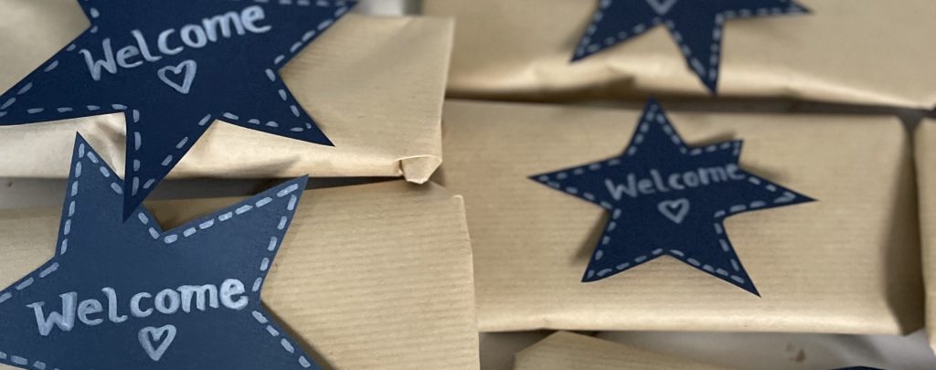 Bild zeigt Sterne mit der Aufschrift "Welcome".